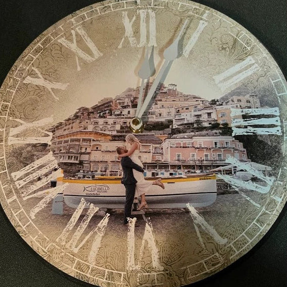 Paulette’s personalized travel photo clock featuring a couple beside a boat in Positano